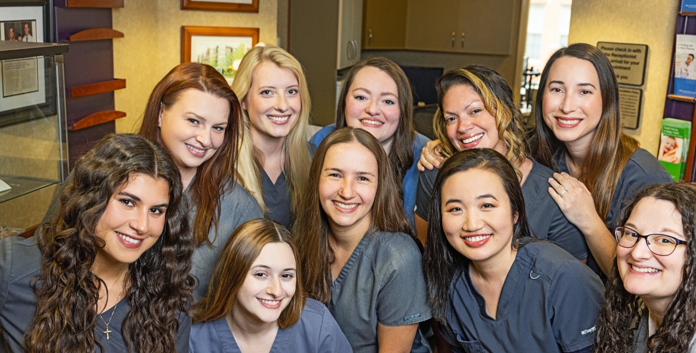 Large group of Blue Back Dental team members smiling