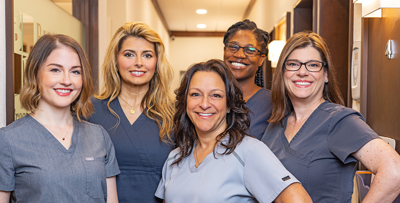 Several smiling Blue Back Dental team members