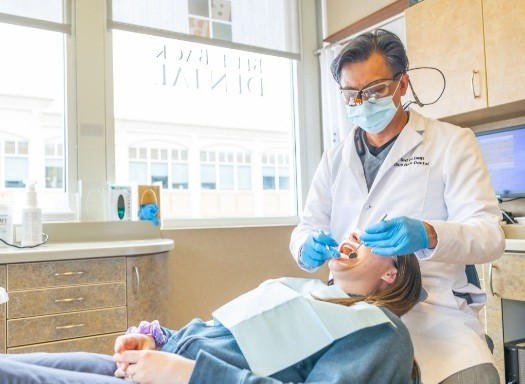 Doctor Wu treating a dental patient