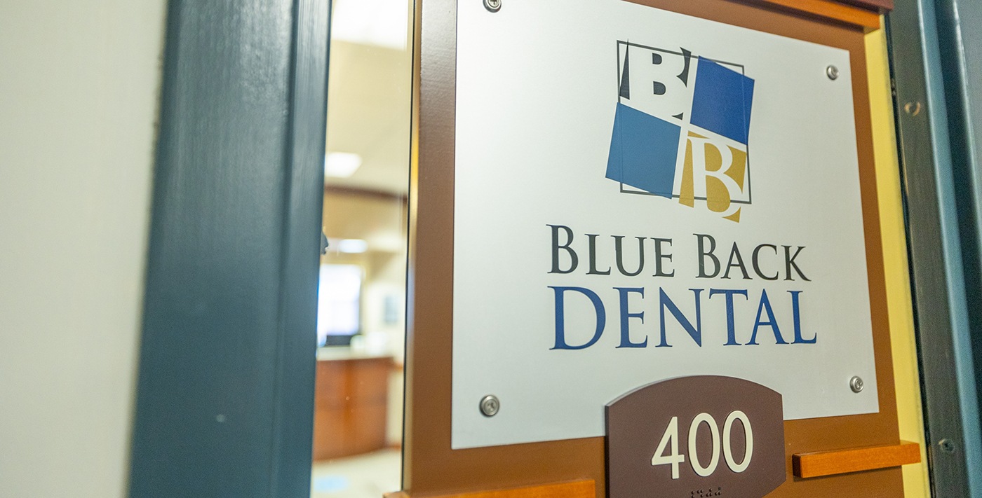 Blue Back Dental sign on outside of door